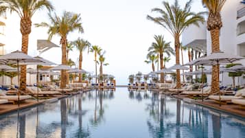 Outdoor pool, pool cabanas (surcharge), pool umbrellas