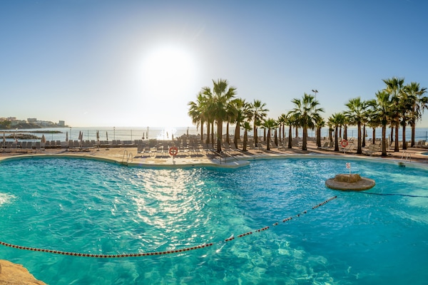 2 outdoor pools, pool umbrellas, sun loungers