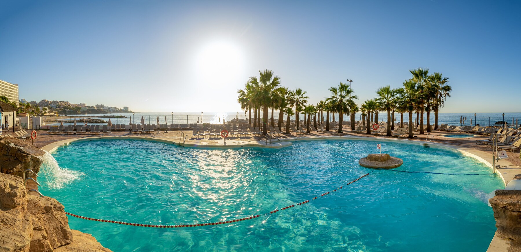 2 outdoor pools, pool umbrellas, pool loungers