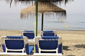 On the beach, sun loungers, beach umbrellas, beach towels - Marbella Playa Hotel (Marbella)