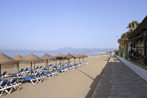 On the beach, sun-loungers, beach umbrellas, beach towels - Marbella Playa Hotel (Marbella)