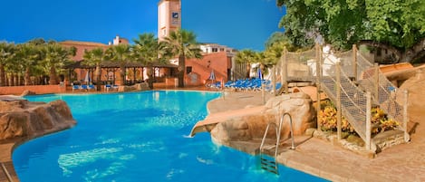 Indoor pool, outdoor pool, pool umbrellas, sun loungers