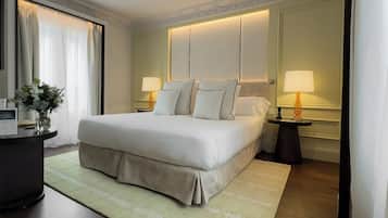 Premium bedding, down comforters, minibar, in-room safe