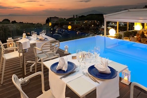 Lunsj og middag serveres, italienske retter, utsikt mot golfbanen