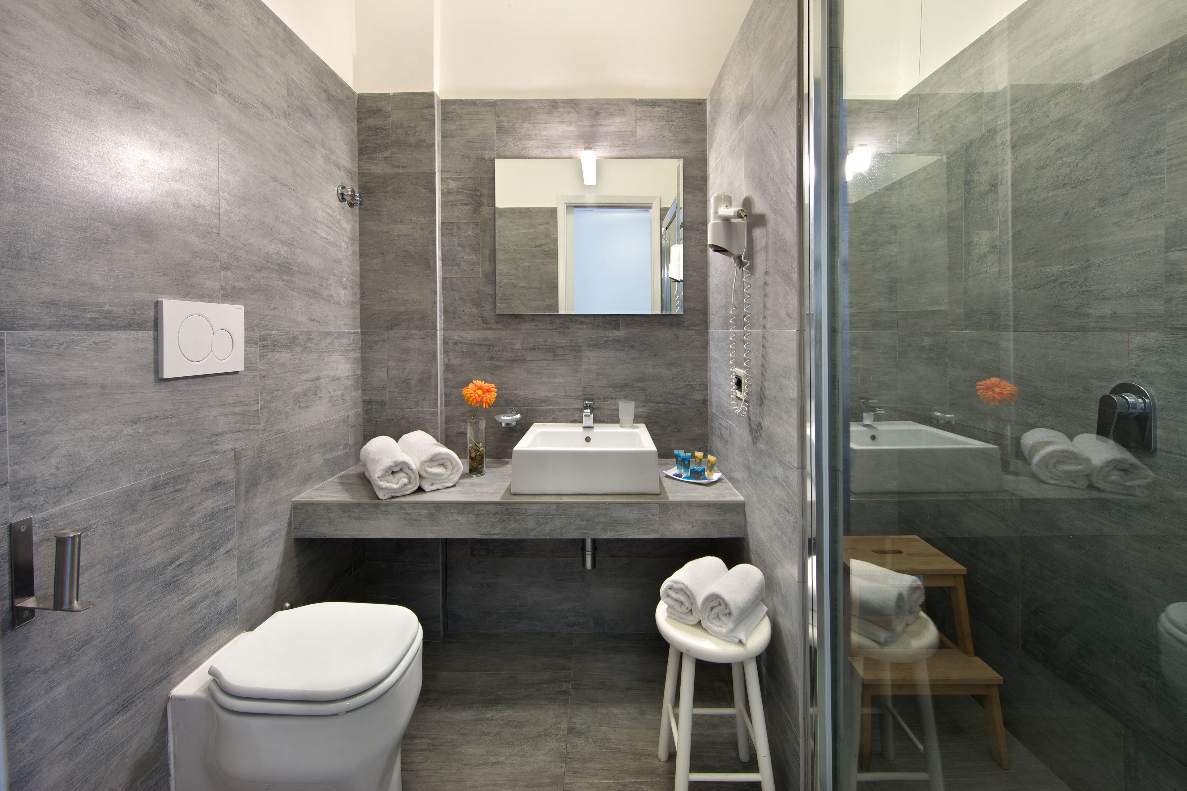 rainfall showerhead, hair dryer, bidet, towels