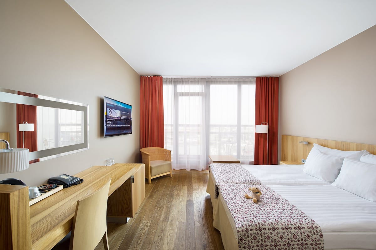 Superior kamer, 1 twee- of 2 eenpersoonsbedden | Hypoallergeen beddengoed, donzen dekbedden, een minibar