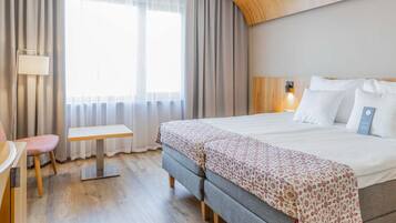 Hypo-allergenic bedding, down duvets, minibar, in-room safe