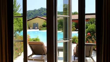 Suite Junior (2 Adults) | Copriletto in piuma, minibar, una cassaforte in camera