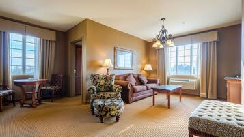 Executive Suite, 1 King Bed with Sofa bed | Living room | 32-inch LCD TV with cable channels, TV, MP3 dock