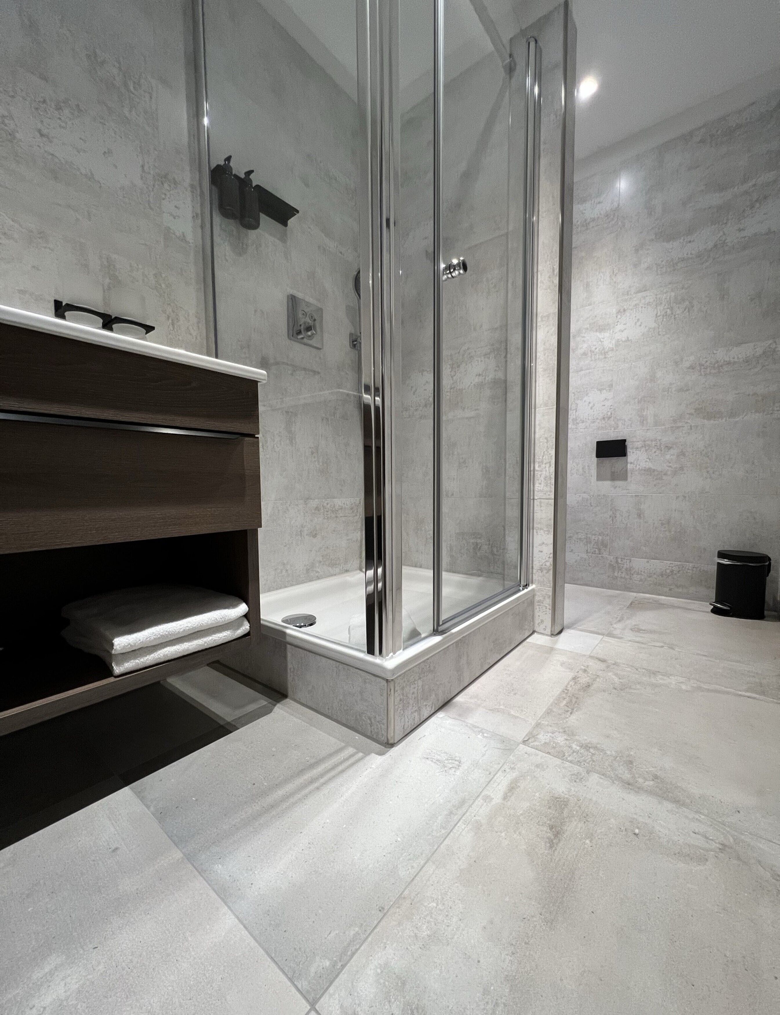 quadruple room | bathroom | shower, free toiletries, hair dryer, dressing gowns