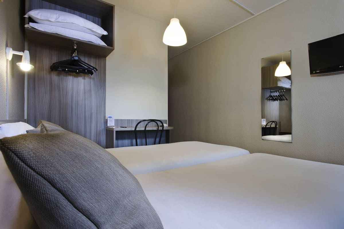 Premium bedding, down comforters, desk, blackout drapes