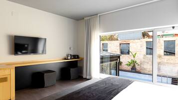 Superior Room | Minibar, individually decorated, desk, blackout curtains