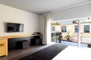 Superior kamer | Een minibar, individueel gedecoreerd, een bureau