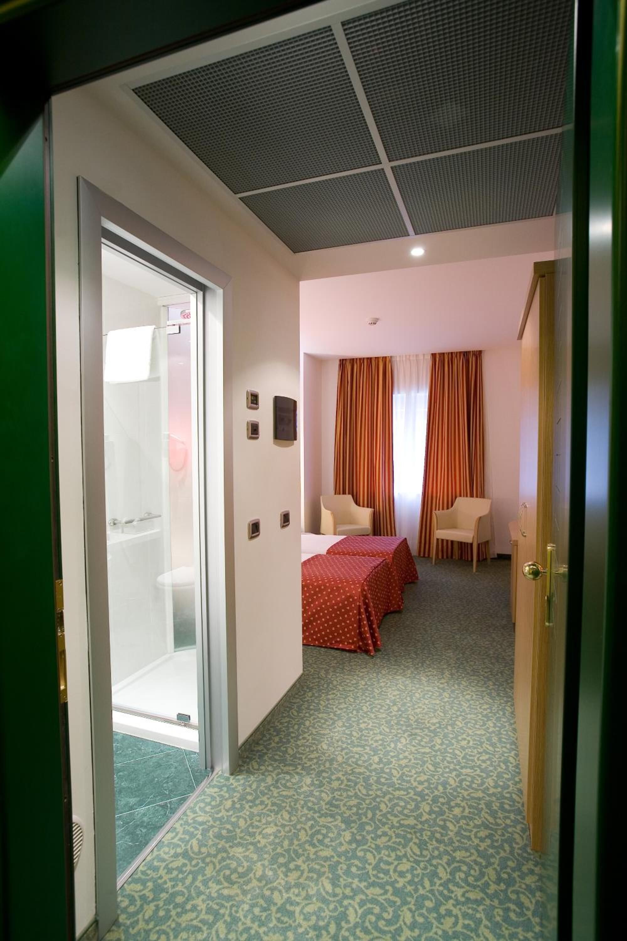 free toiletries, hair dryer, slippers, bidet