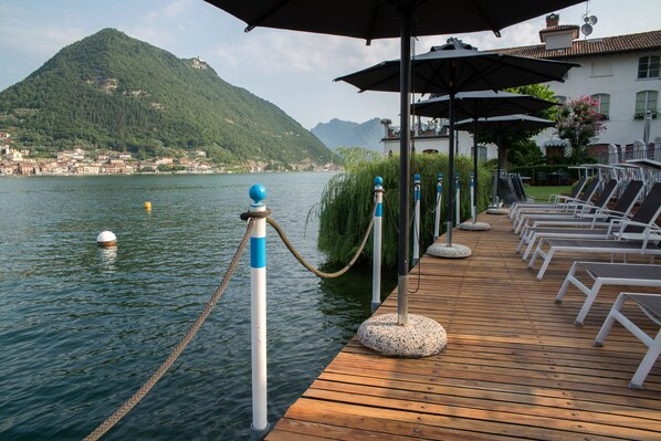 Seasonal outdoor pool, pool umbrellas, sun loungers