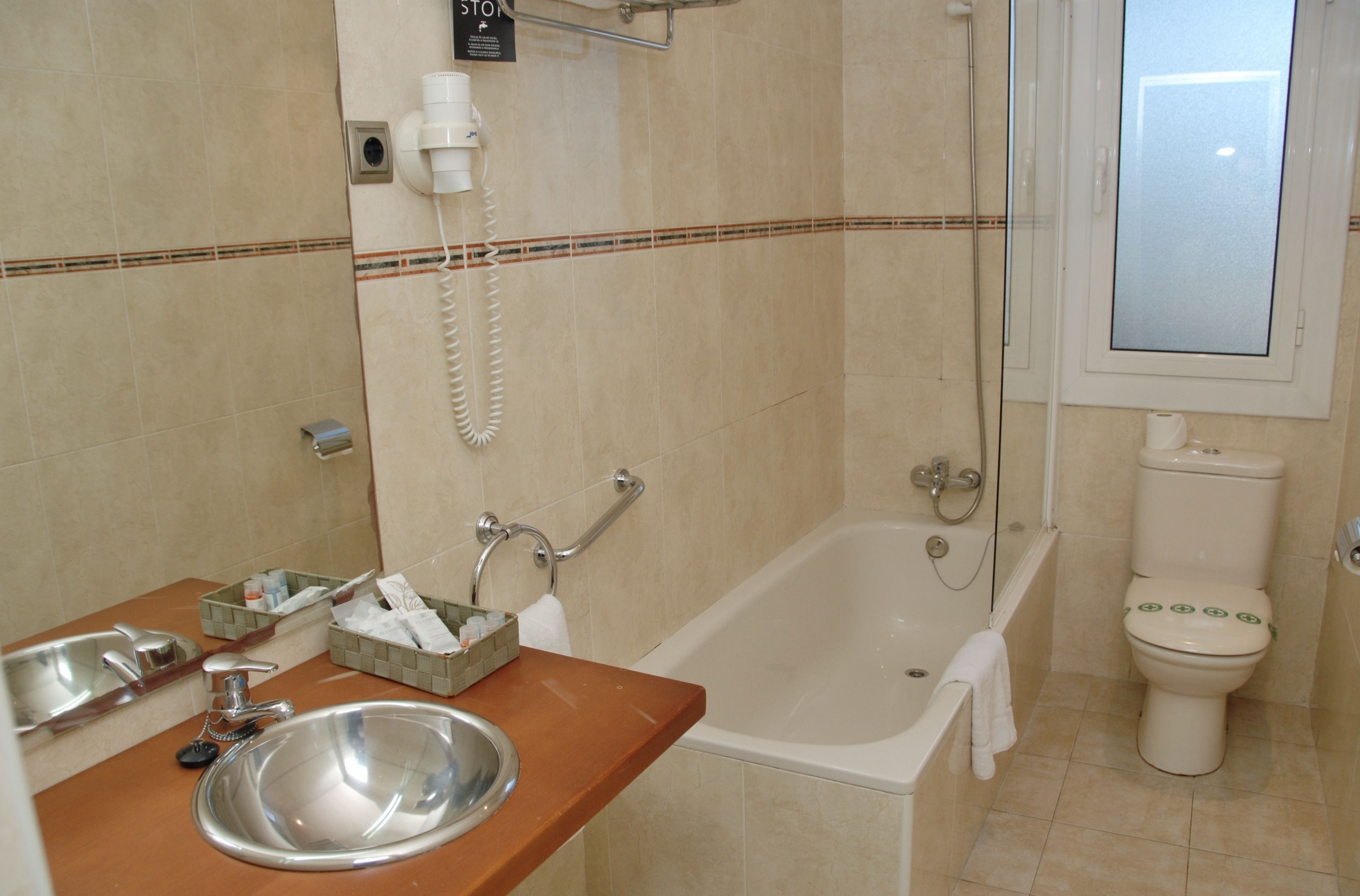 free toiletries, hair dryer, bidet, towels