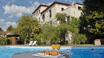 Outdoor pool, open 10:00 AM to 8:00 PM, sun loungers