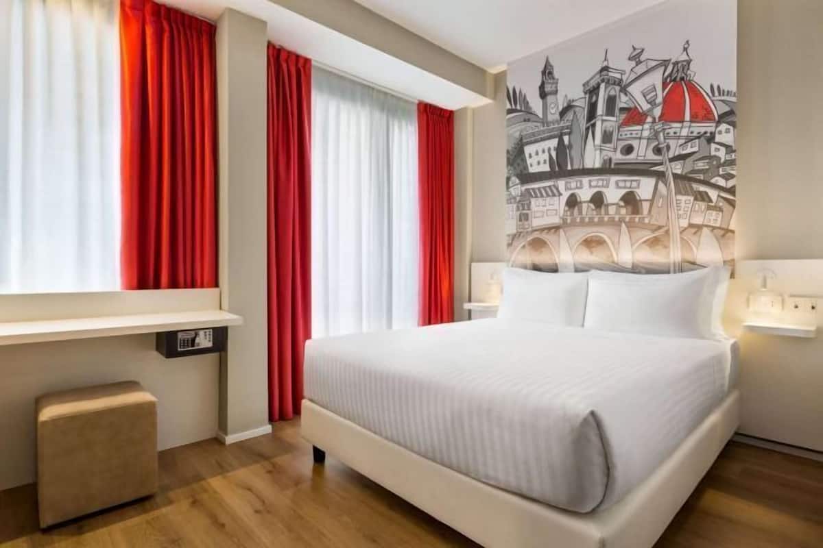 Premium bedding, down comforters, pillowtop beds, minibar