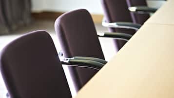 A conference table with chairs.