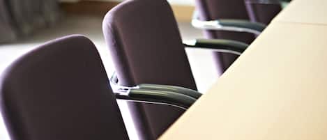 A conference table with chairs.