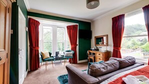 A room with a bed, a desk, a chair, and a TV. - Old Rose and Crown Hotel (Birmingham)