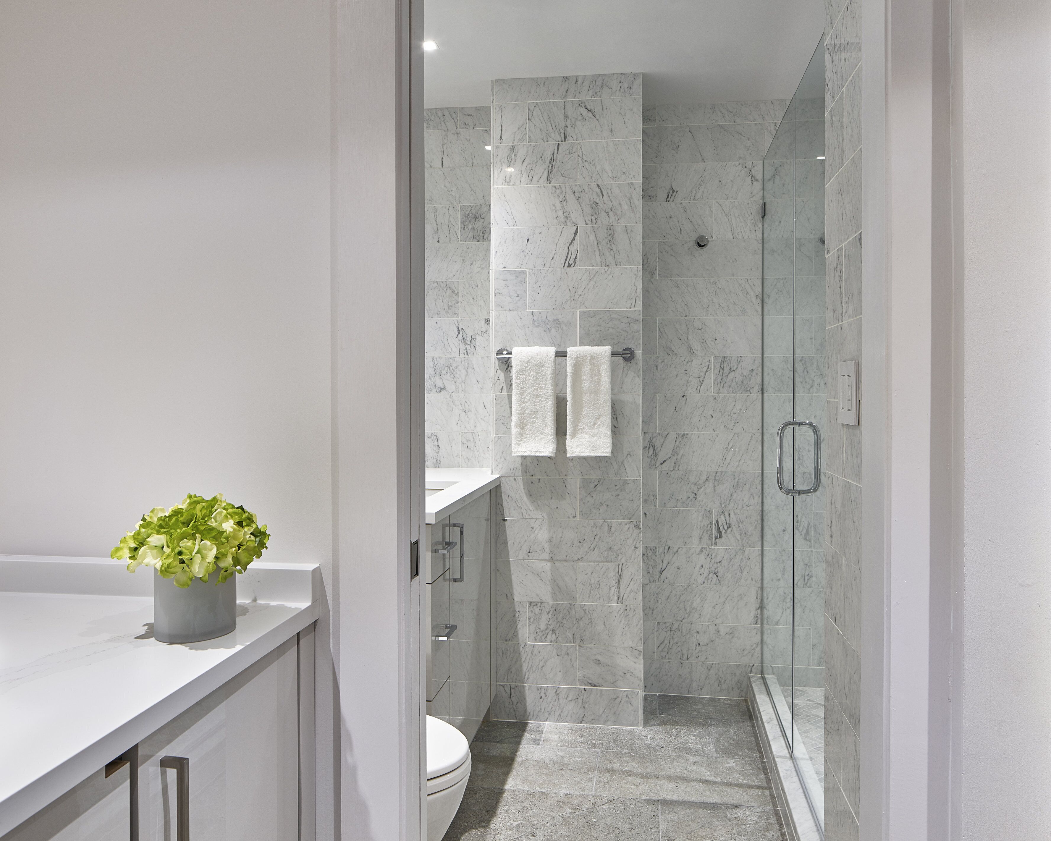 shower, designer toiletries, towels, soap