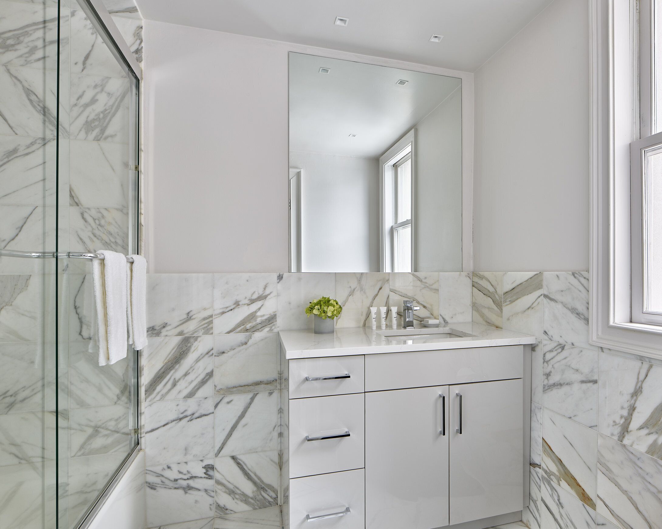 shower, designer toiletries, towels, soap