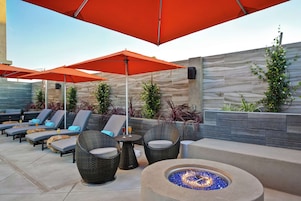 Outdoor pool, open 9:00 AM to 10:00 PM, free cabanas, pool umbrellas