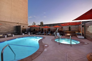 Outdoor pool, open 8:00 AM to 10:00 PM, free cabanas, pool umbrellas