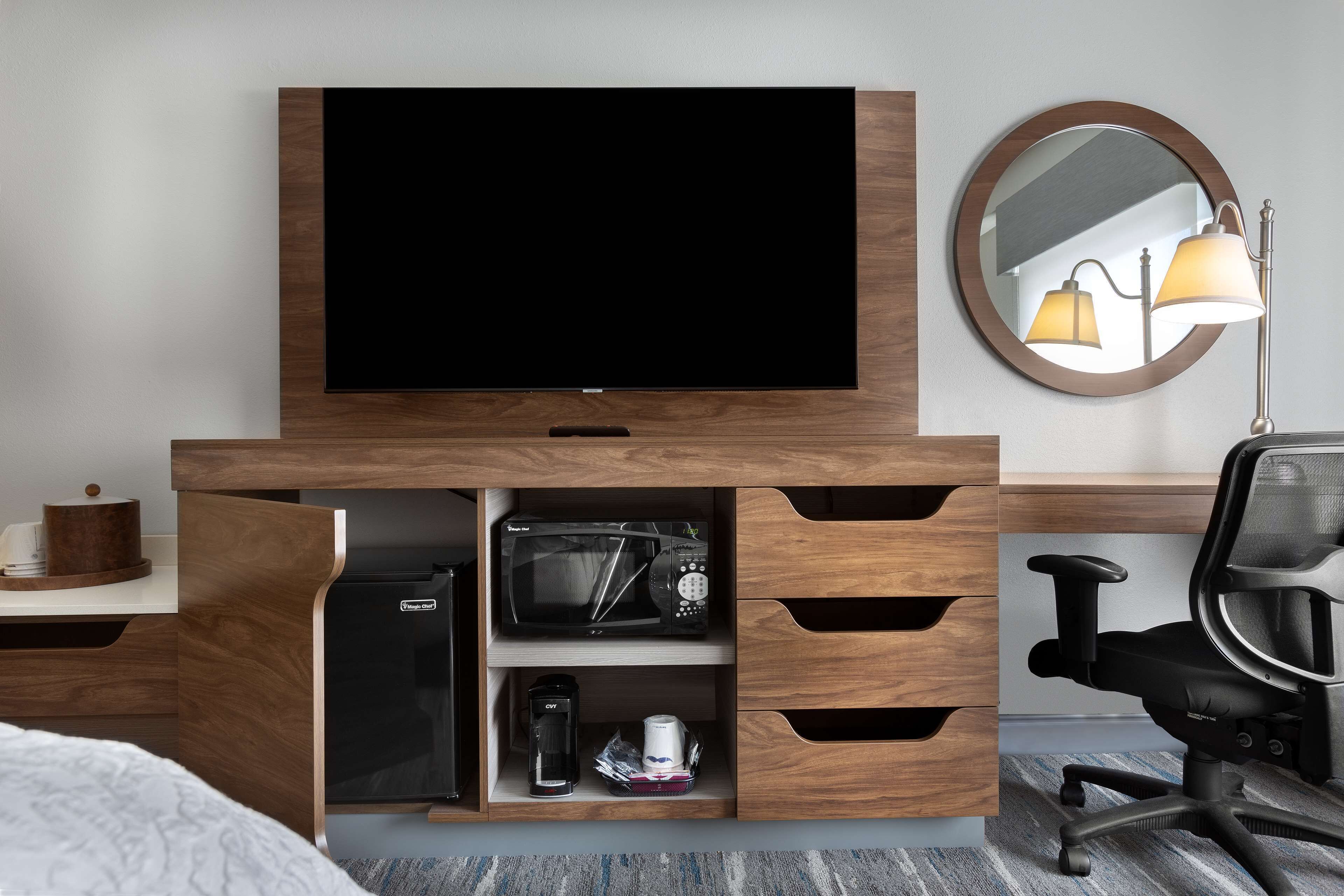 desk, laptop workspace, blackout curtains, iron/ironing board