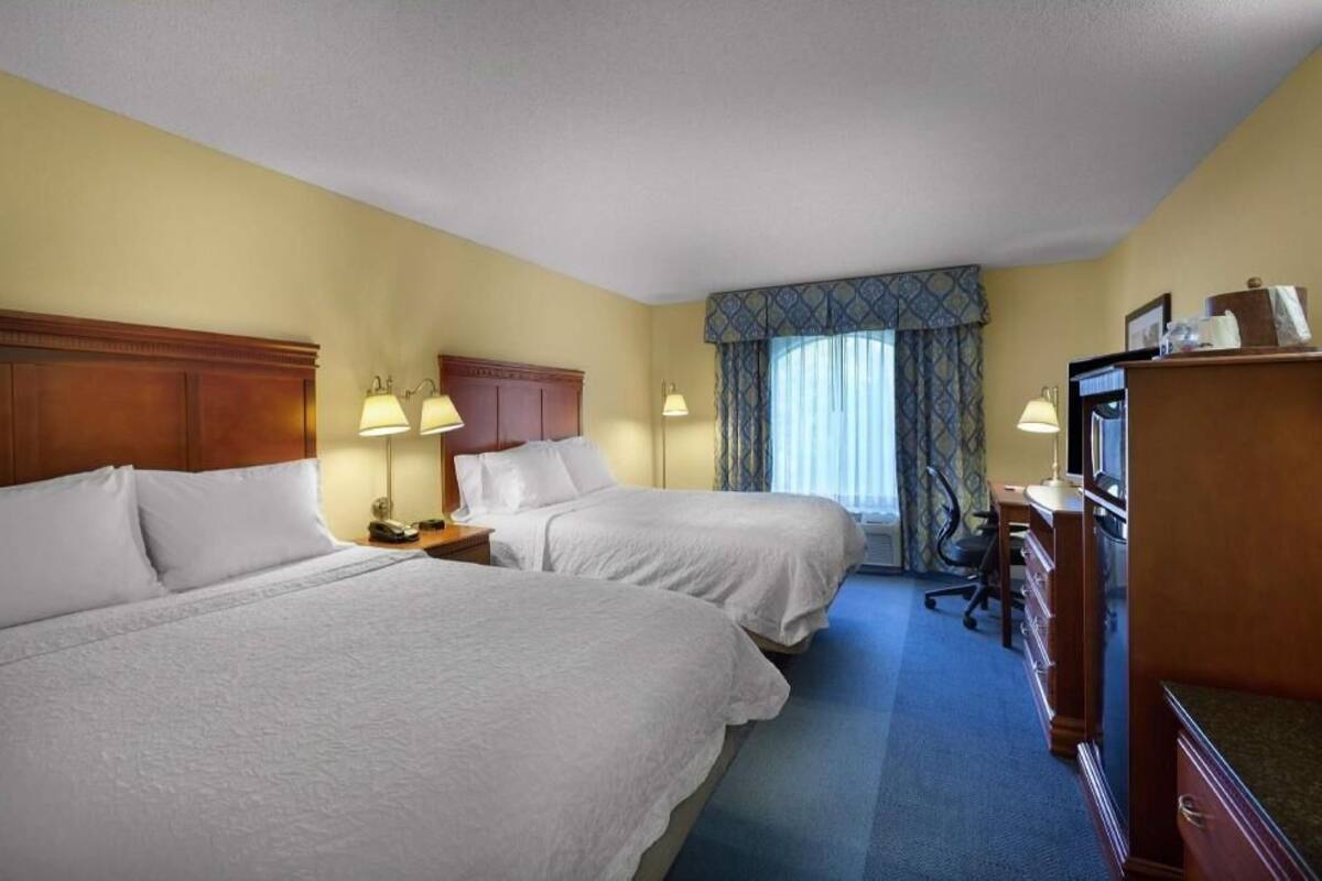 Desk, laptop workspace, blackout curtains, iron/ironing board