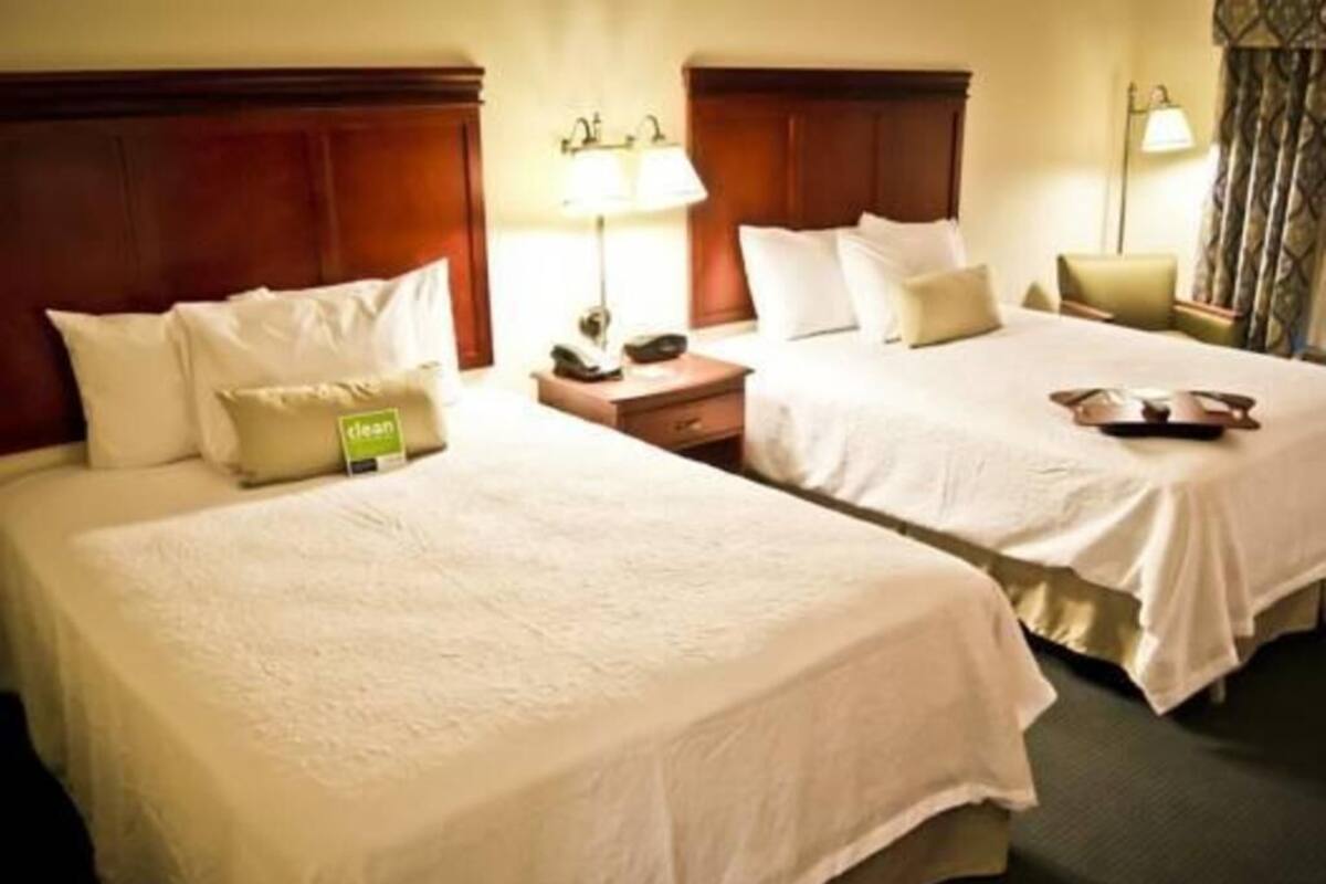 Desk, laptop workspace, blackout curtains, iron/ironing board