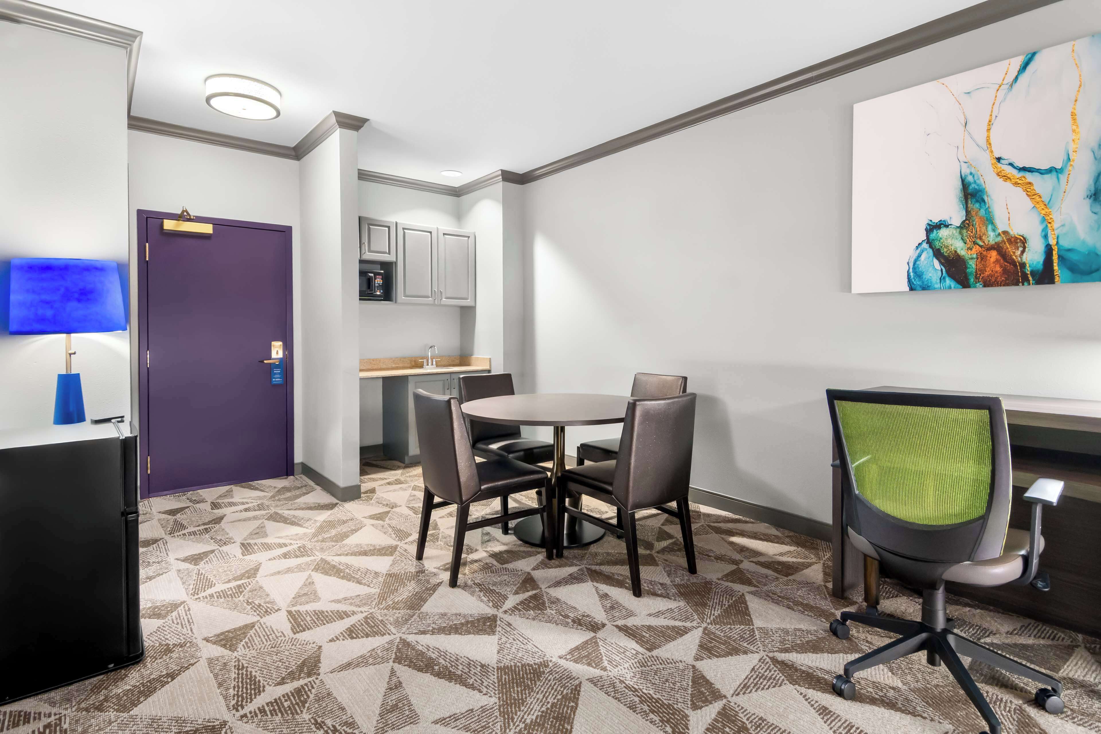 suite, 1 king bed, non smoking, refrigerator & microwave (dining table;larger room;with sofabed) | desk, iron/ironing board, free wifi, bed sheets