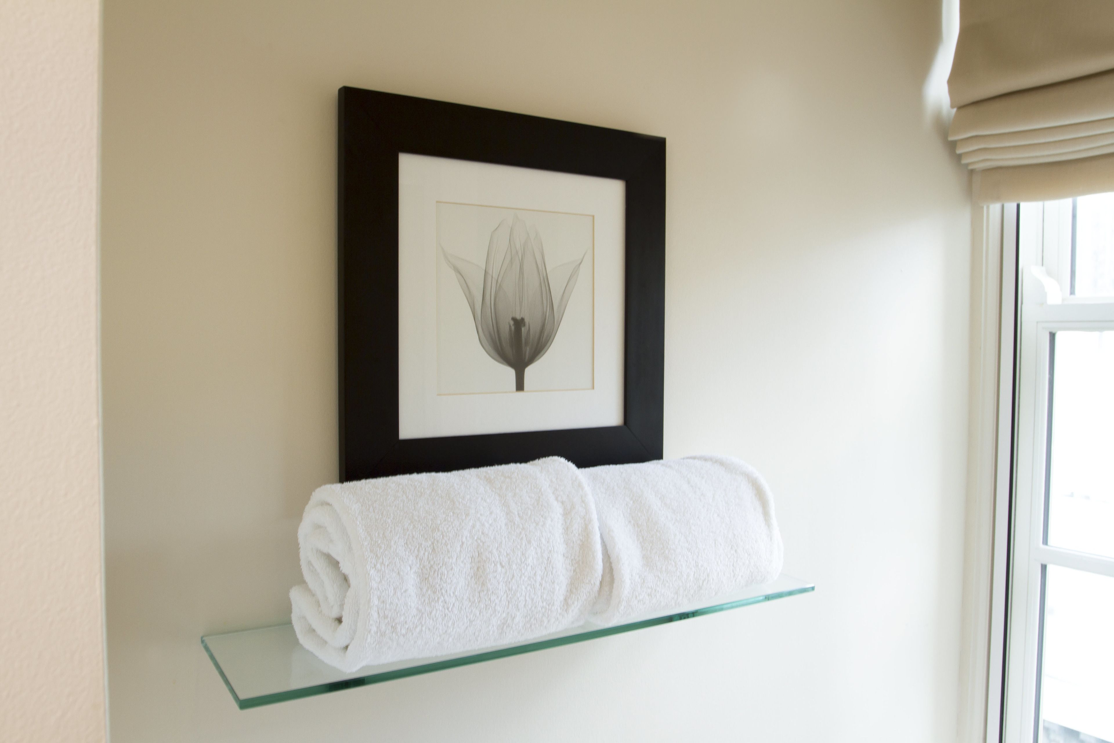 rainfall showerhead, designer toiletries, hair dryer, towels