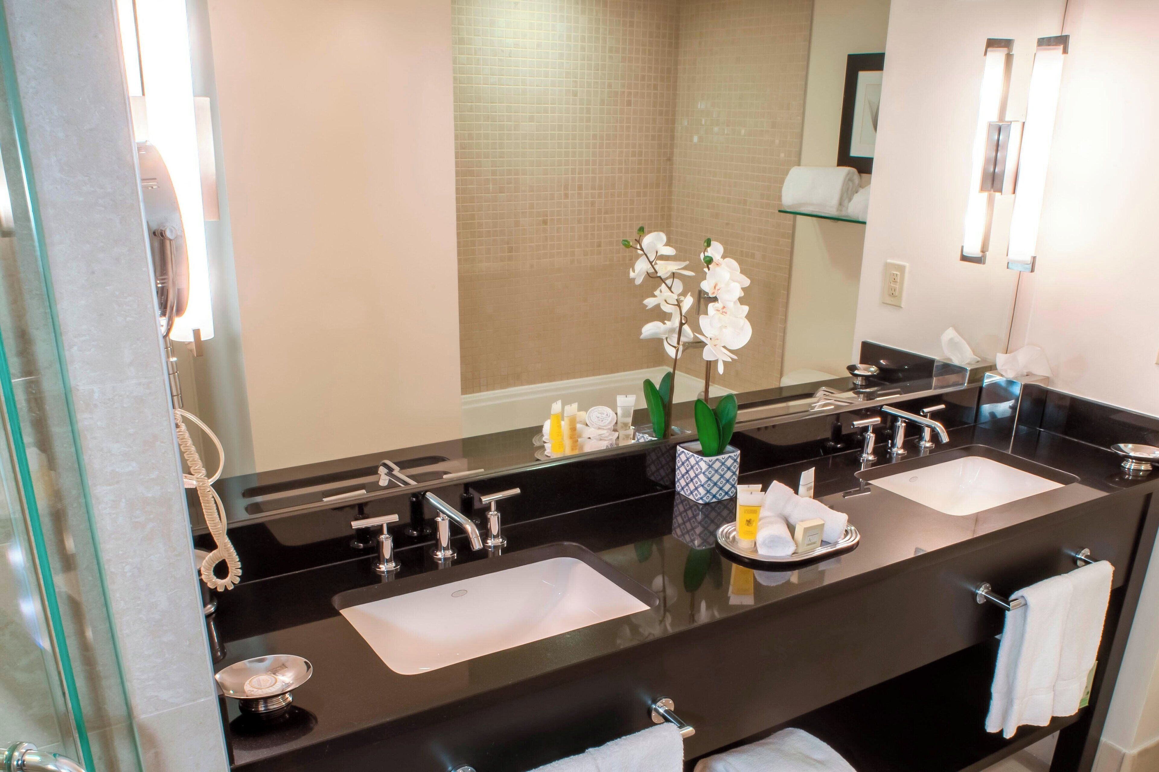 executive suite, 1 bedroom | bathroom | rainfall showerhead, designer toiletries, hair dryer, towels