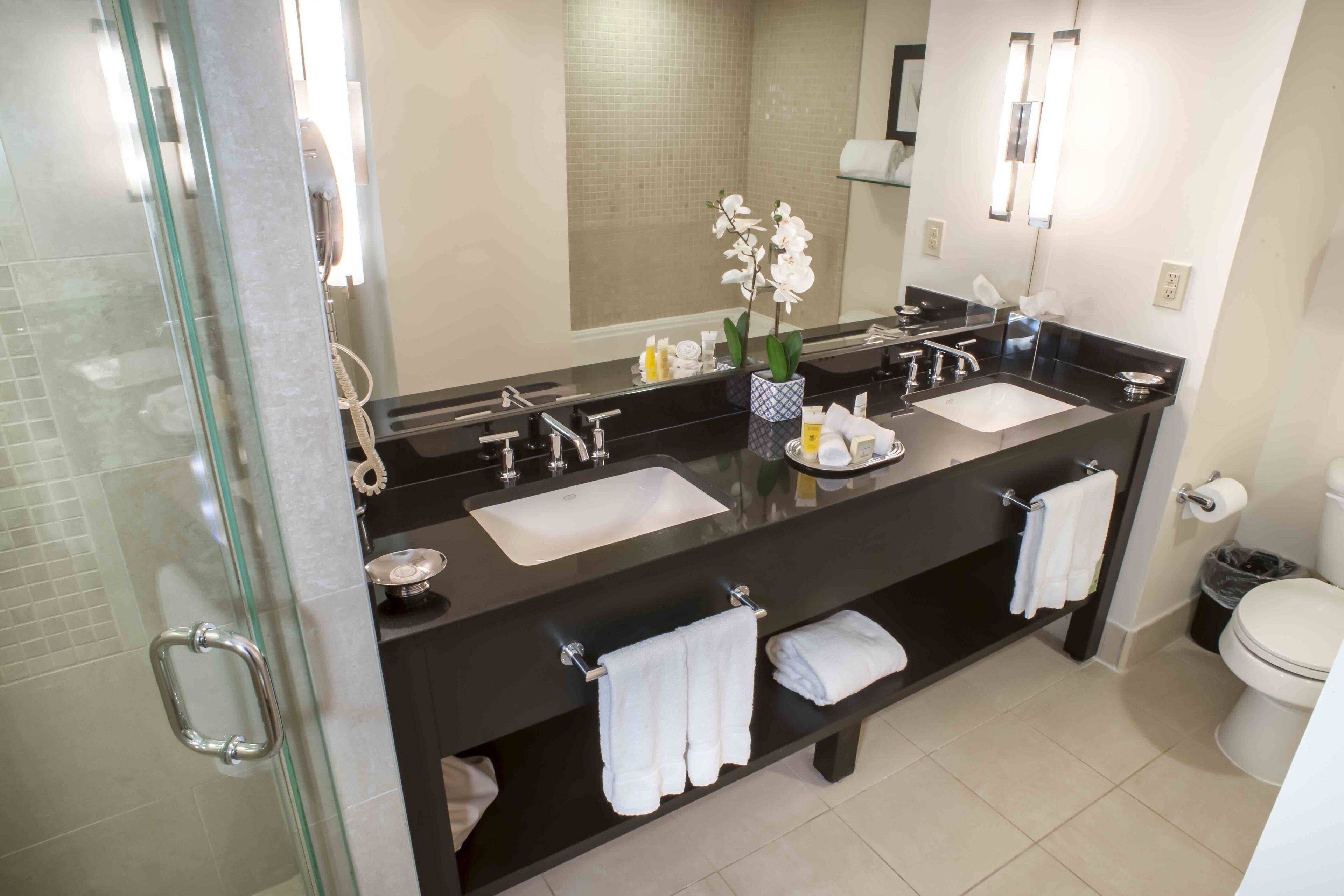 executive suite, 1 bedroom | bathroom | rainfall showerhead, designer toiletries, hair dryer, towels