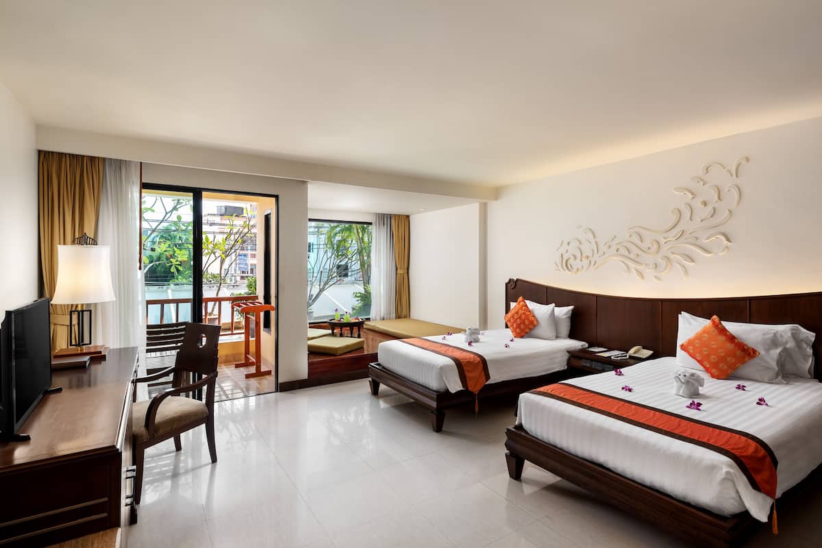 Deluxe Room | 1 bedroom, premium bedding, in-room safe, individually decorated