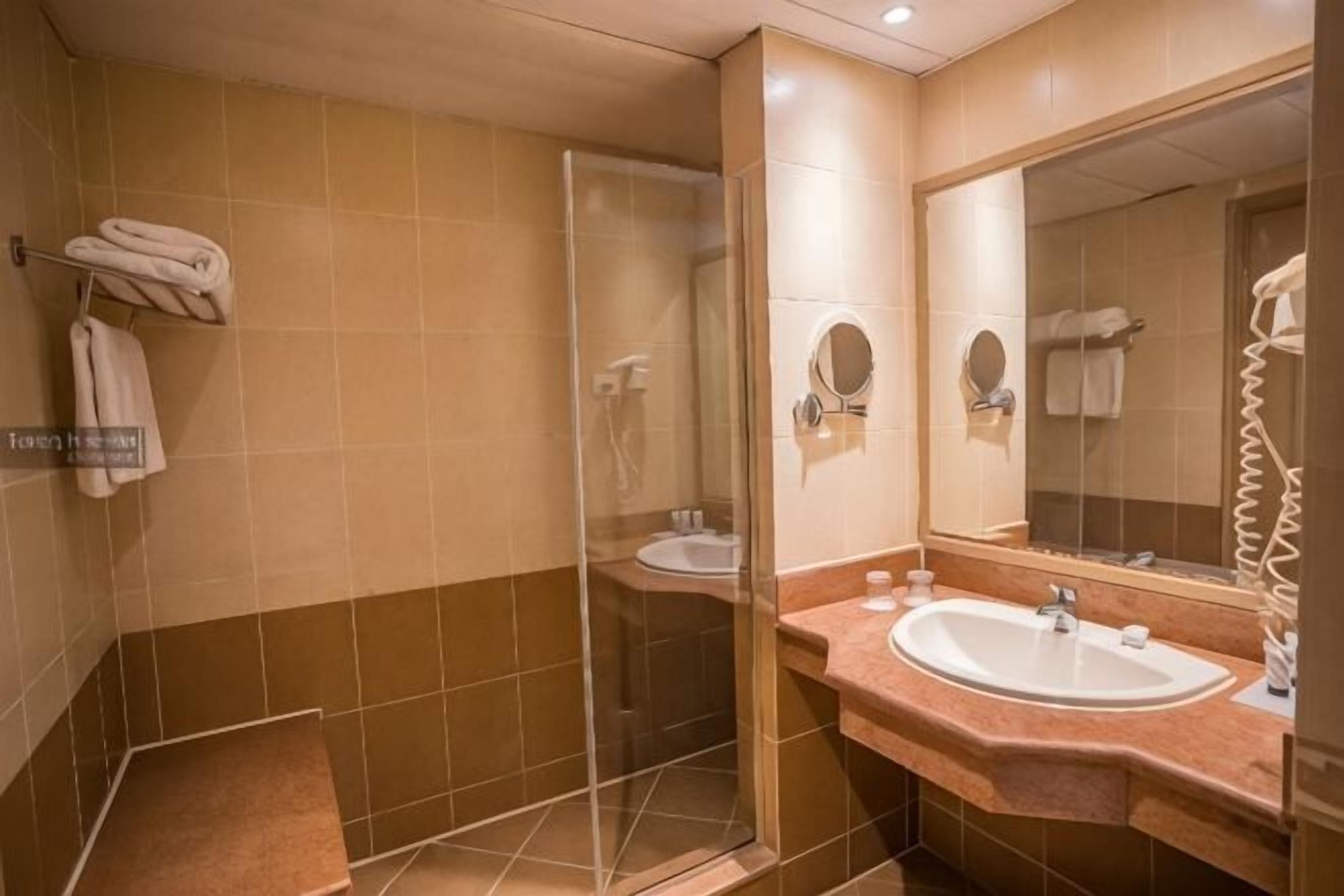 Bathroom | Shower, free toiletries, hair dryer, bathrobes