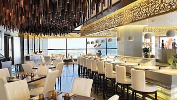 3 restaurants, breakfast, lunch, dinner served; international cuisine