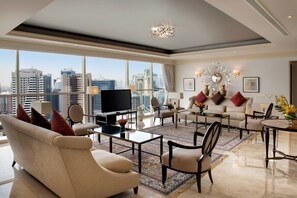 Presidential Suite | Living area | 36-inch LED TV with satellite channels, TV, Netflix