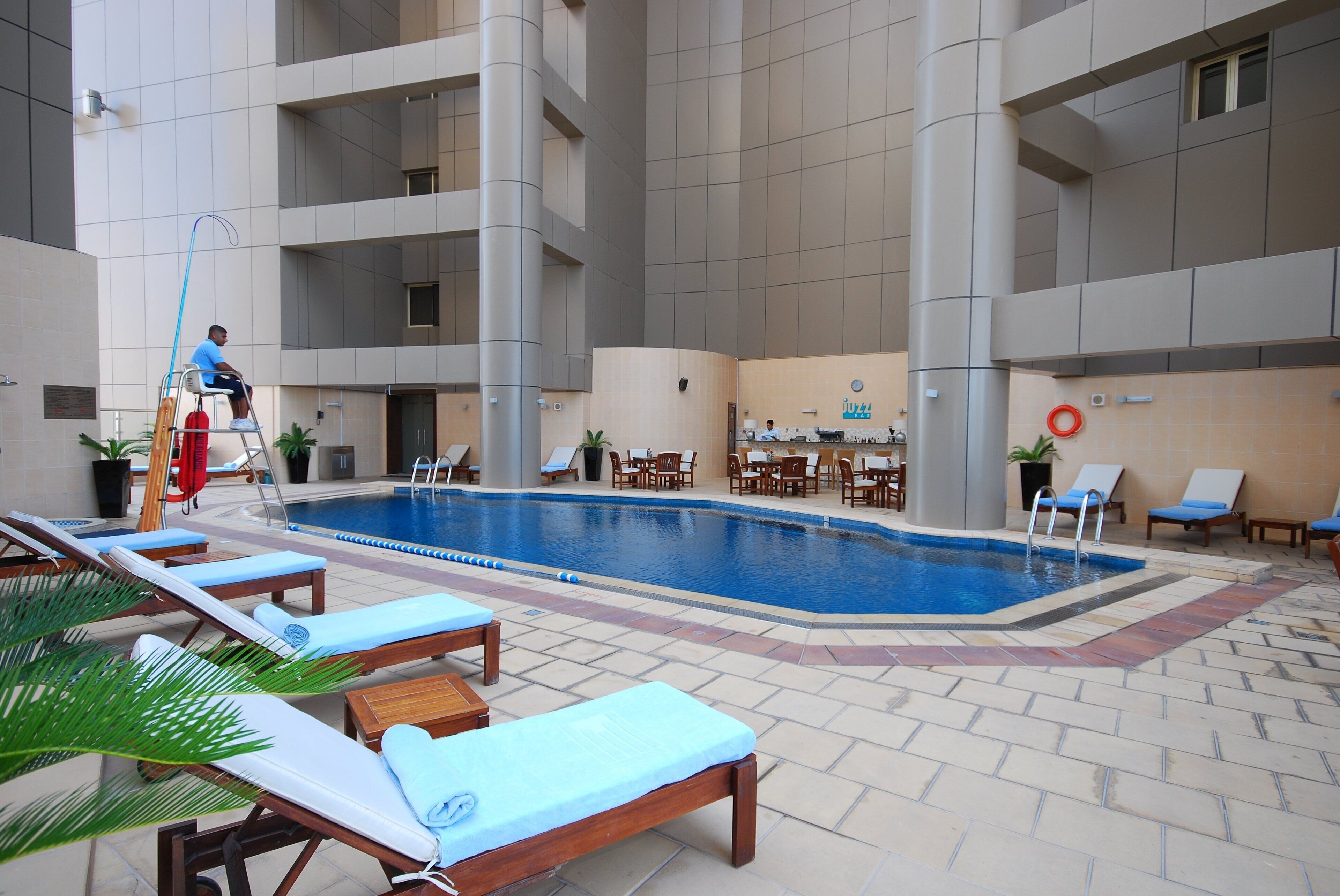 outdoor pool, open 7:00 am to 8:00 pm, pool umbrellas, pool loungers