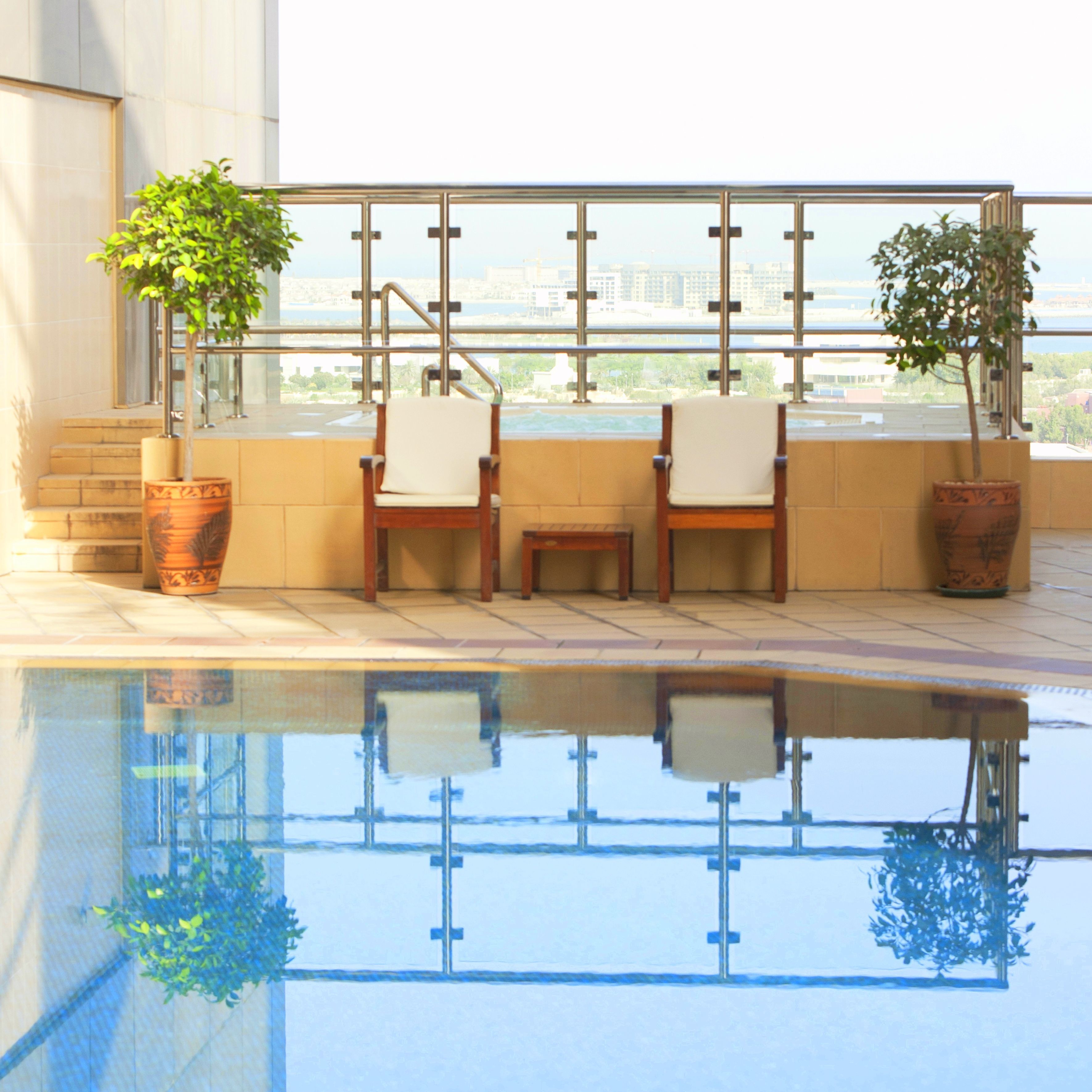 Outdoor pool, open 7:00 AM to 8:00 PM, pool umbrellas, sun loungers