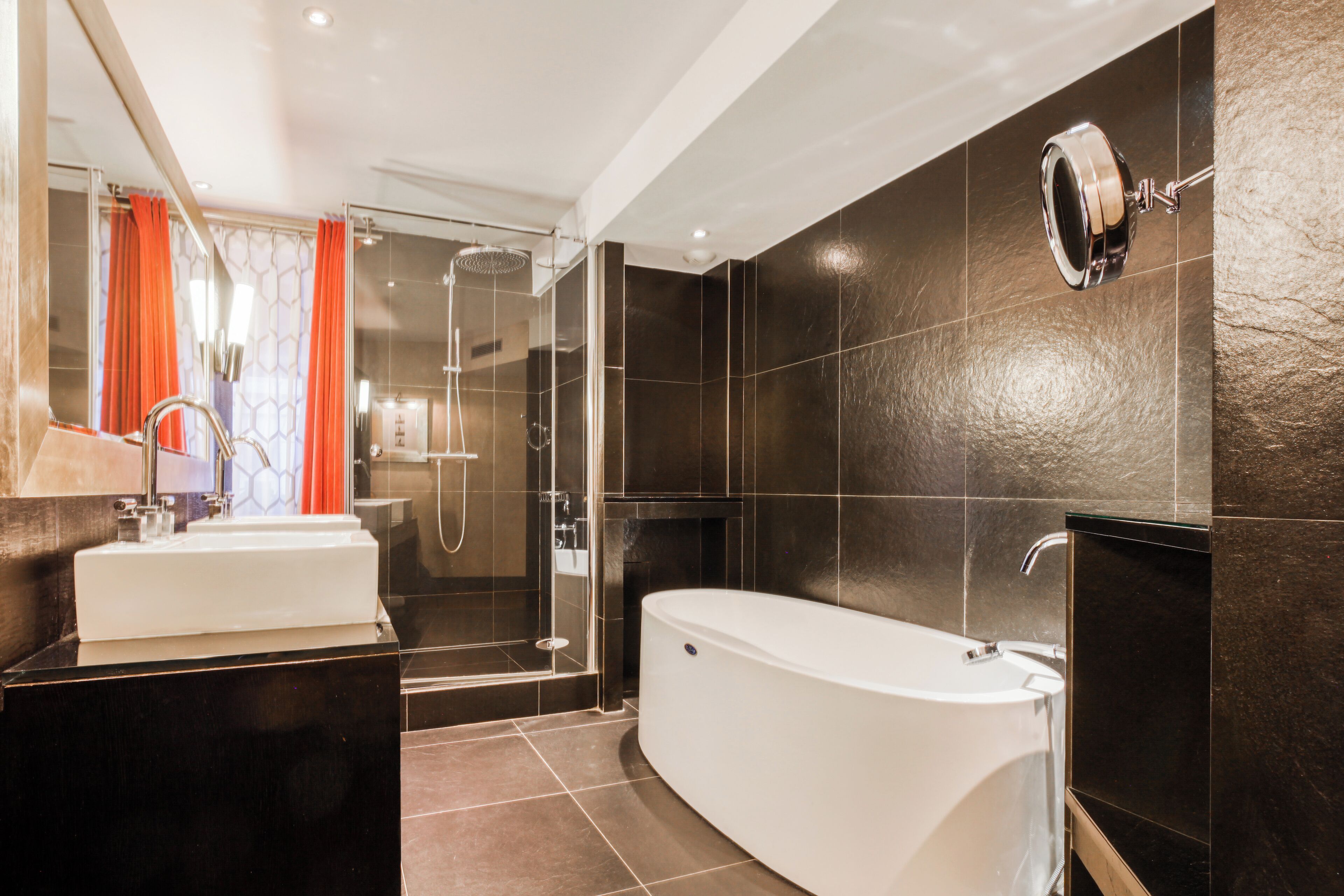 deluxe room | bathroom | eco-friendly toiletries, hair dryer, bathrobes, slippers