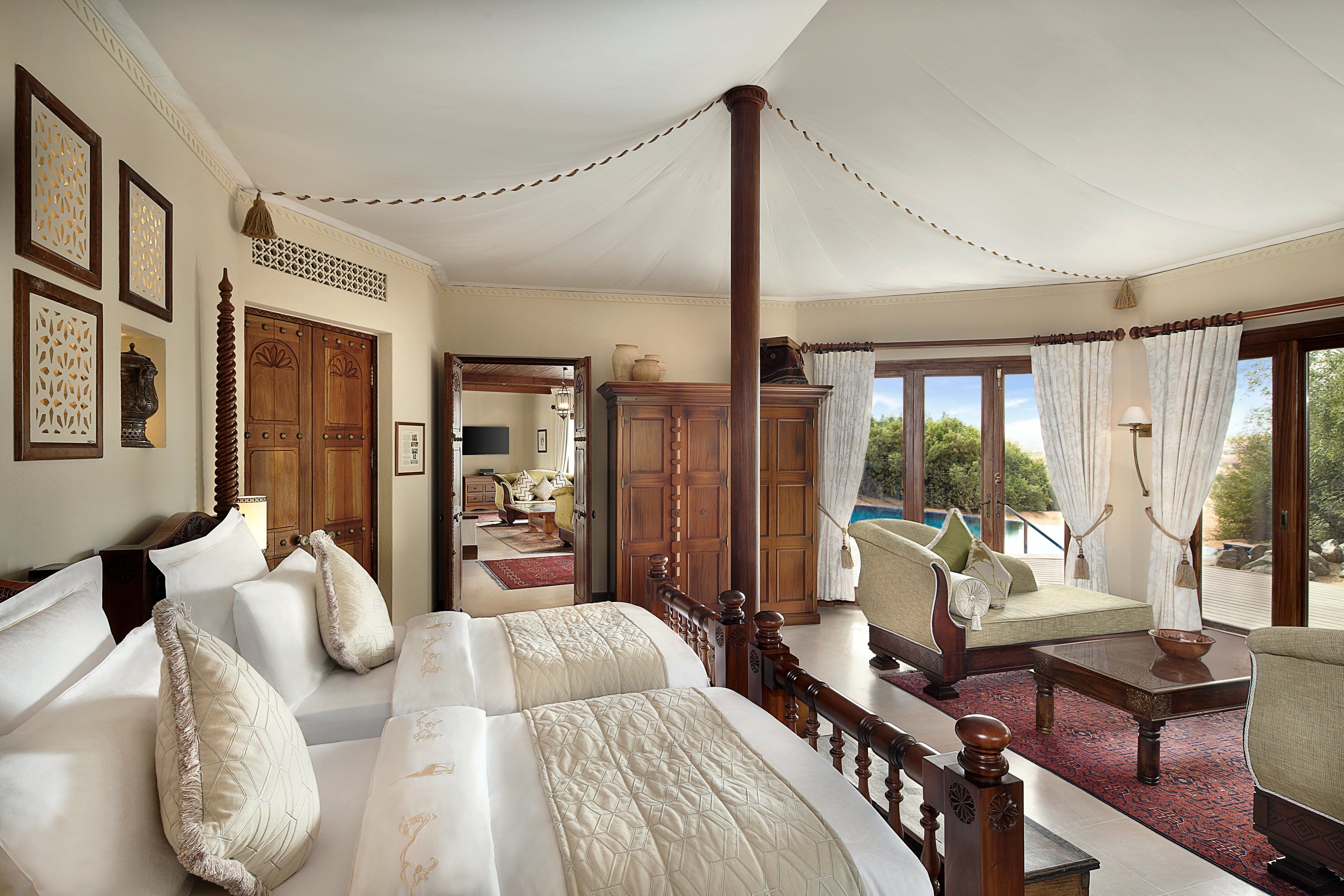 Italiaanse Frette-lakens, luxe beddengoed, een minibar