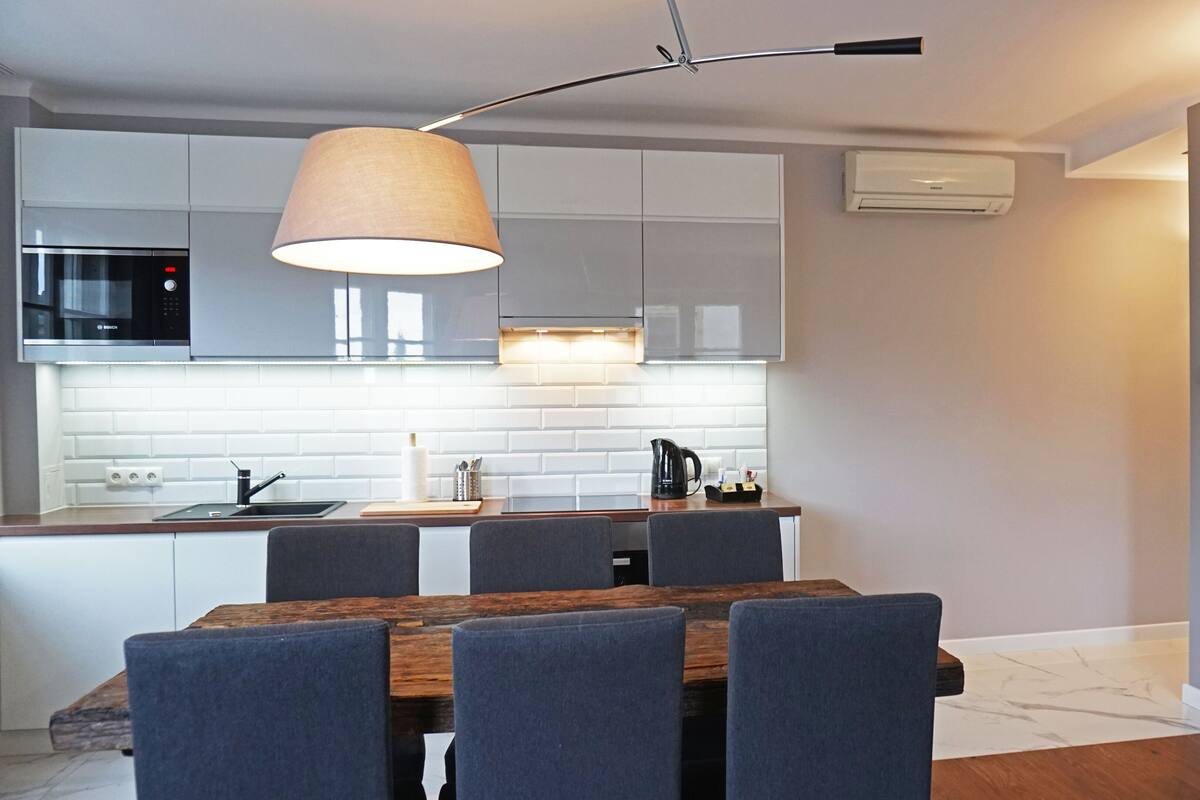 Panoramic Suite | Living room | 40-inch LCD TV with satellite channels, TV