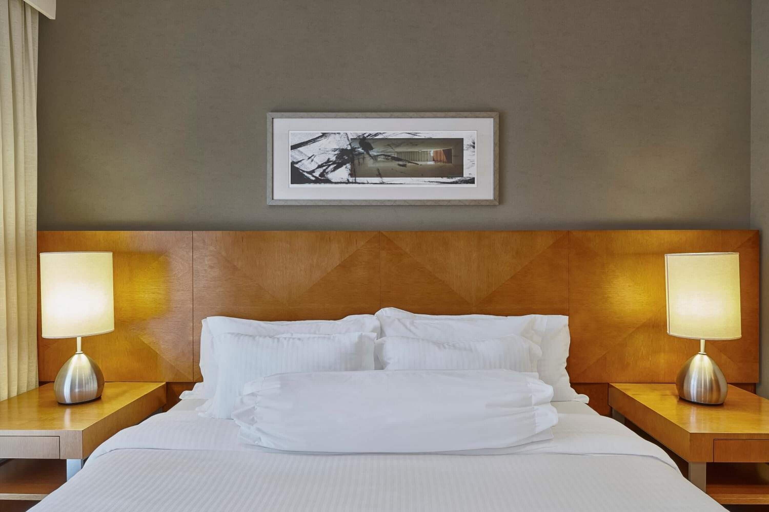 deluxe suite | pillow-top beds, in-room safe, desk, blackout curtains