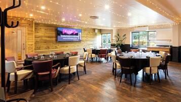 Breakfast, lunch, dinner served; local cuisine