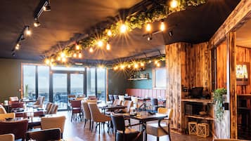 Breakfast, lunch, dinner served; local cuisine