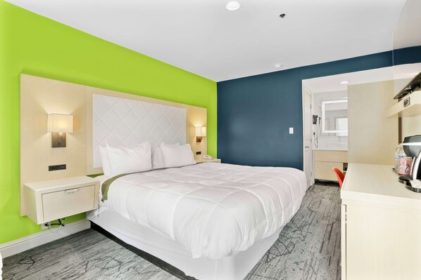 Room, 1 King Bed | Desk, blackout drapes, iron/ironing board, free WiFi