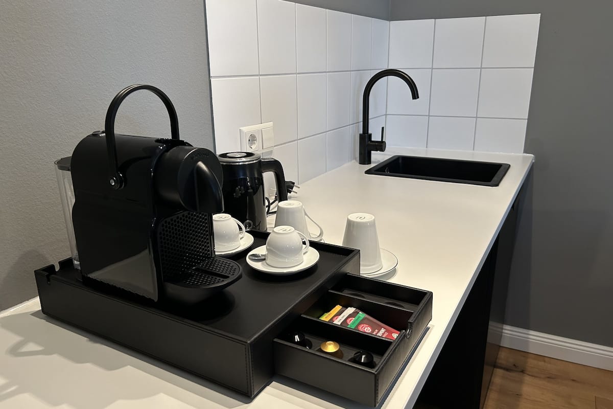 hypo-allergenic bedding, desk, laptop workspace, iron/ironing board